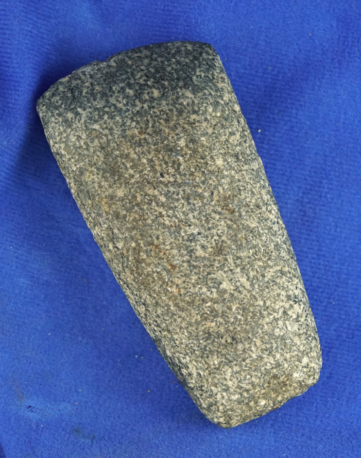 4 1/8" granite Celt with good use polished to bit area found in southern Michigan.