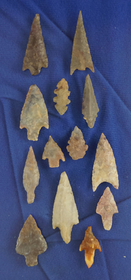 pair of assorted African Neolithic arrowheads found in northern Sahara desert region.