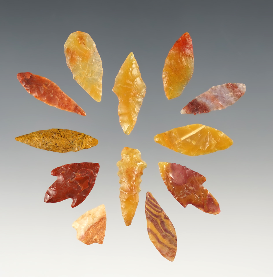 Set of 12 colorful African Neolithic points. The largest is 1".