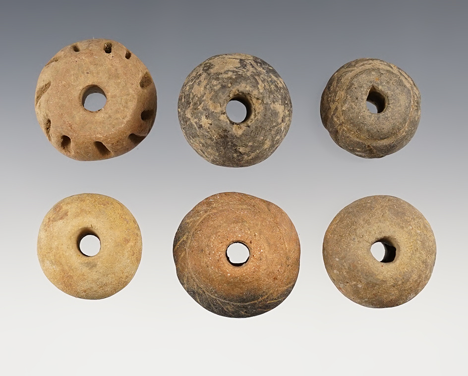 Set of 6 Pre Columbian Beads/Whirls in excellent condition. The largest is 1 1/4".