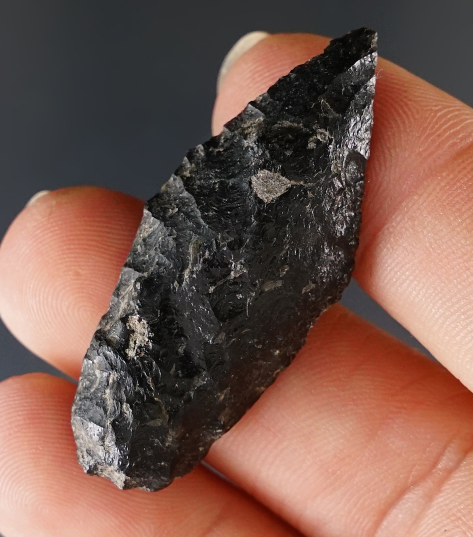 1 11/16" Inuit point found in Alaska and made from patinated Obsidian.