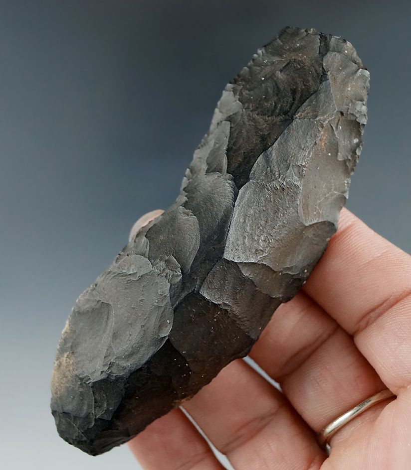 4 5/8" Uniface knife first scraper that is heavily patinated and nicely styled found in northern Flo