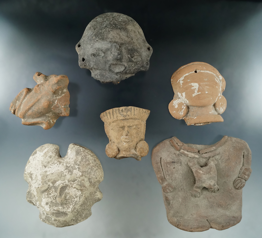 Set of six pre-Columbian pottery heads found in Mexico, largest is 4 1/8".