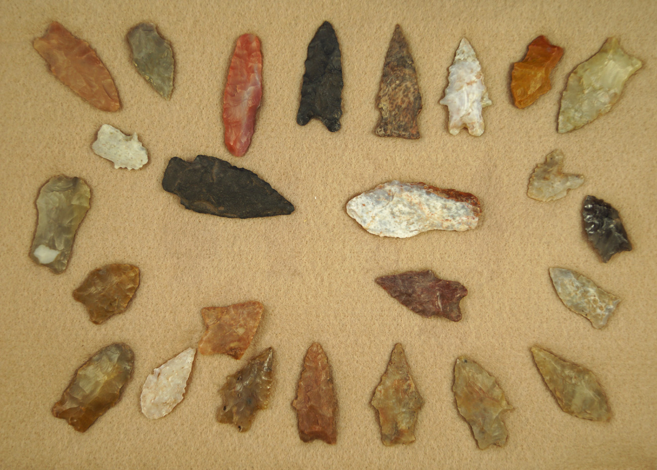 Nice group of 25 assorted arrowheads all found by Kaye Brewer in Arizona. Largest is 2 1/8".