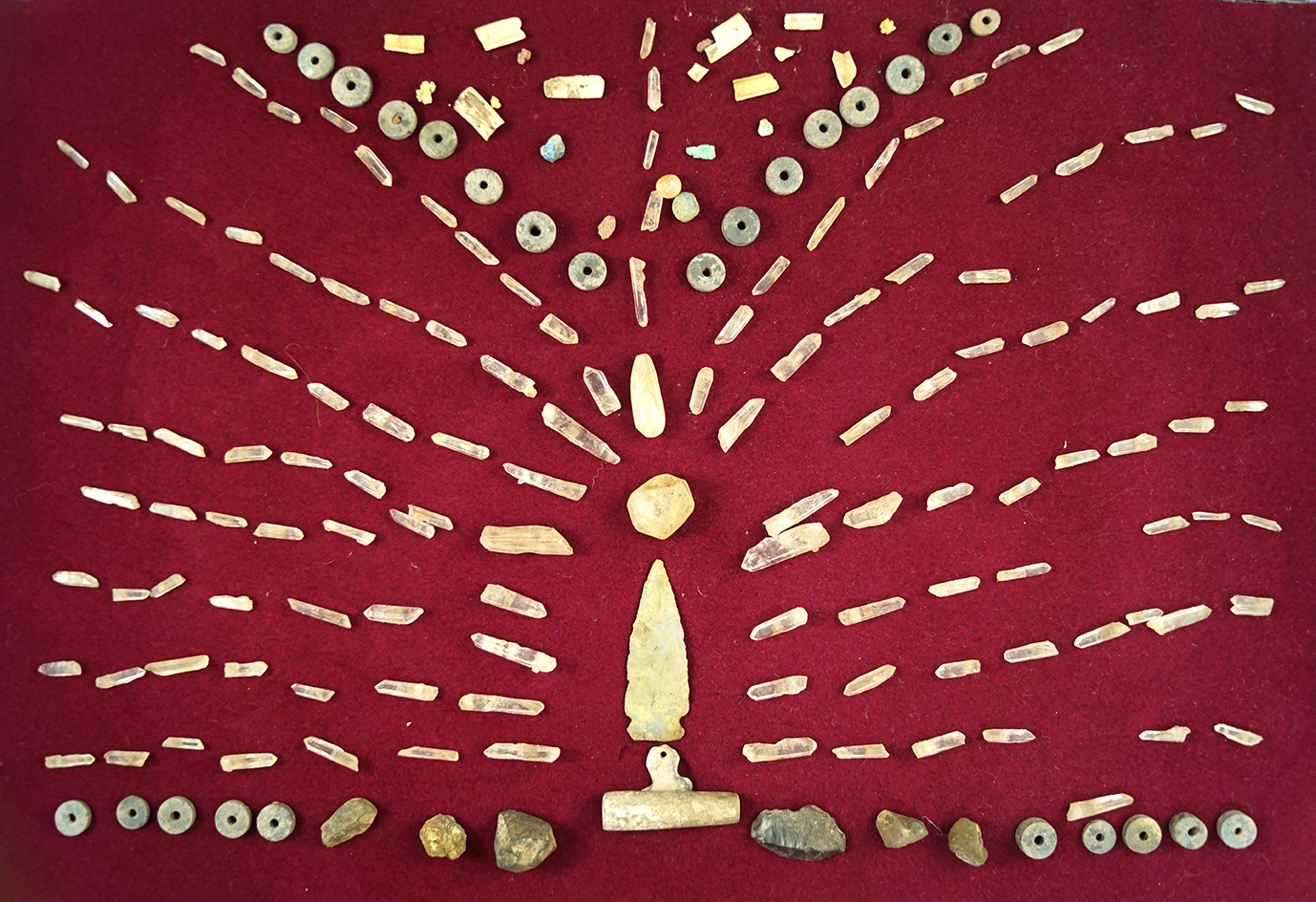 This is an exceptional group of artifacts which were recovered in a pottery vessel -many  crystals.