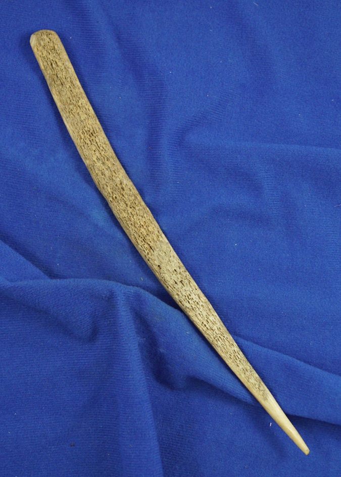 Very large 10 1/2" rib bone awl found near the Missouri River, South Dakota in excellent condition.