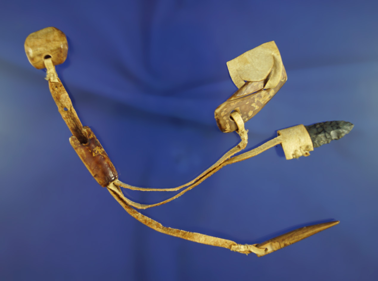 Very unique leather tool "drop" including a bone Awl and a Flint Knife. Found in Alaska.