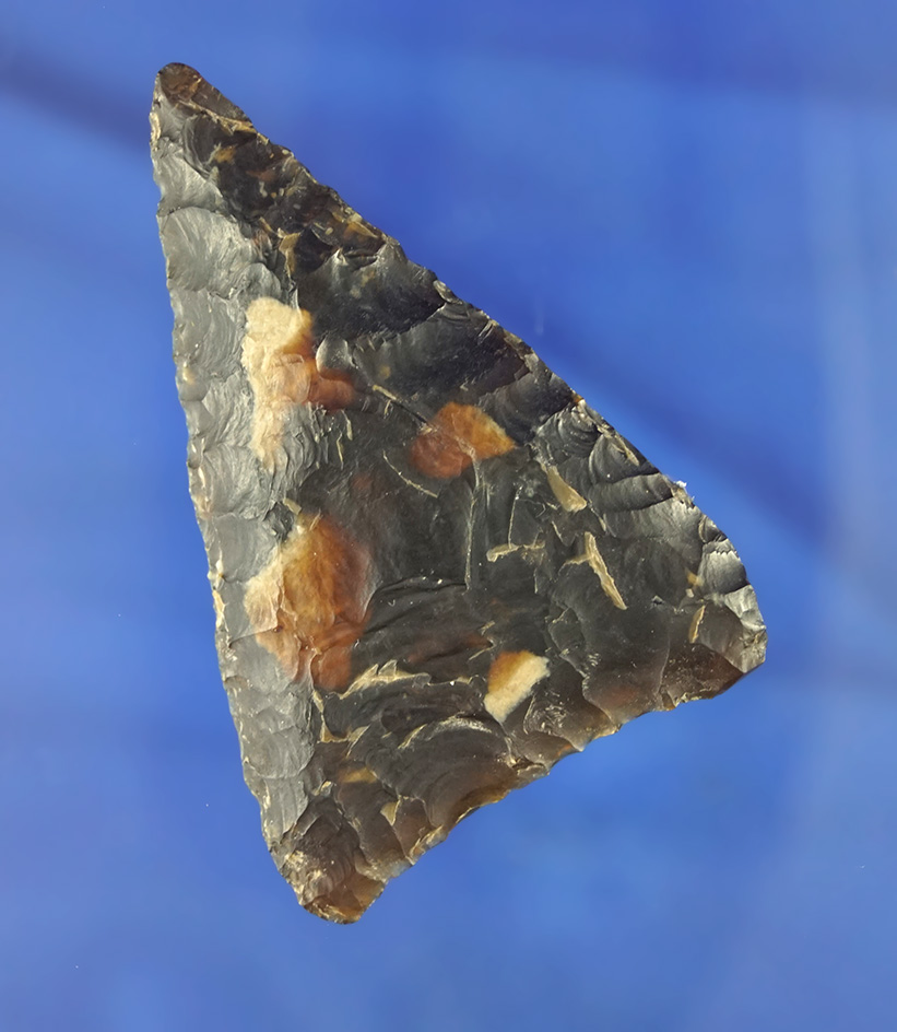 Exceptional 2 1/2" Knife River Flint Triangular Blade found near the Missouri River in South Dakota.