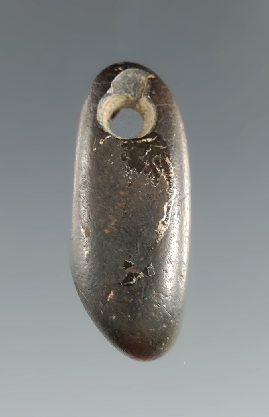 1 1/8" Steatite Pendant found near the Columbia River. Pictured in I.A.M. Ex. Jim Hogue.
