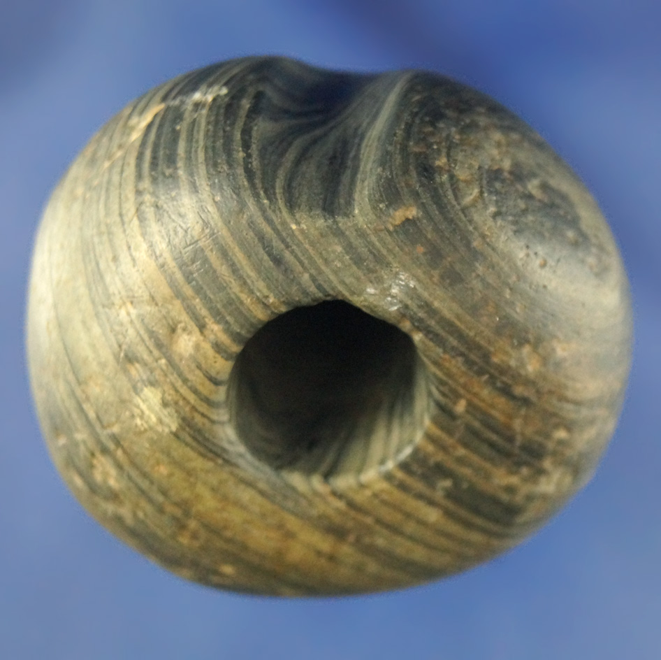 Well patinated 2" fluted Ball Bannerstone found in Ohio.
