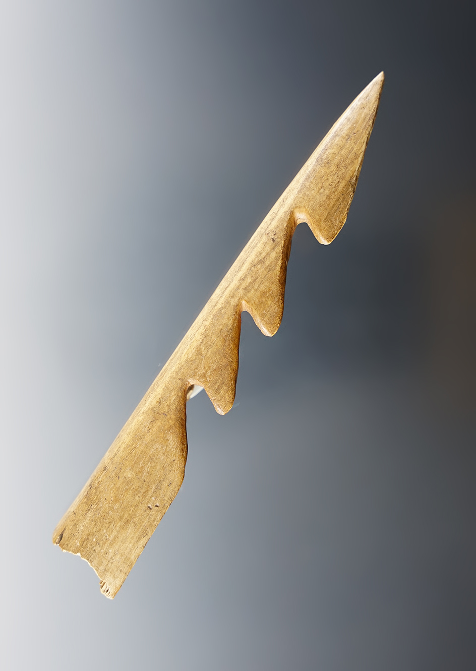 Excellent style on this 4 5/16" bone harpoon found near Kepps Island, New York.