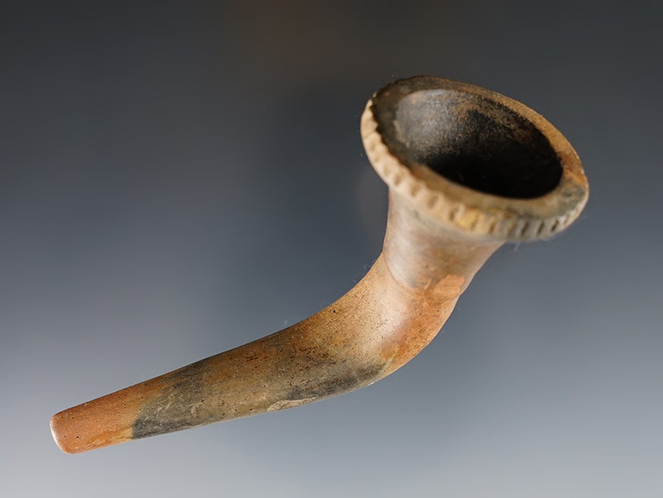 3 3/4" trumpet style Iroquois clay pipe with nice edge work around bowl. Some restoration.