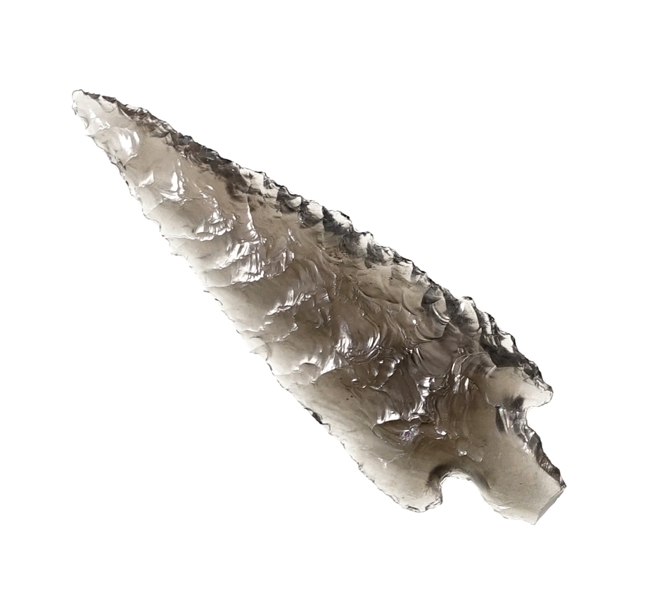 Beautiful edge serrations on this 1 7/8" stemmed point found in Oregon. Ex. C.L. Pugh Museum. 