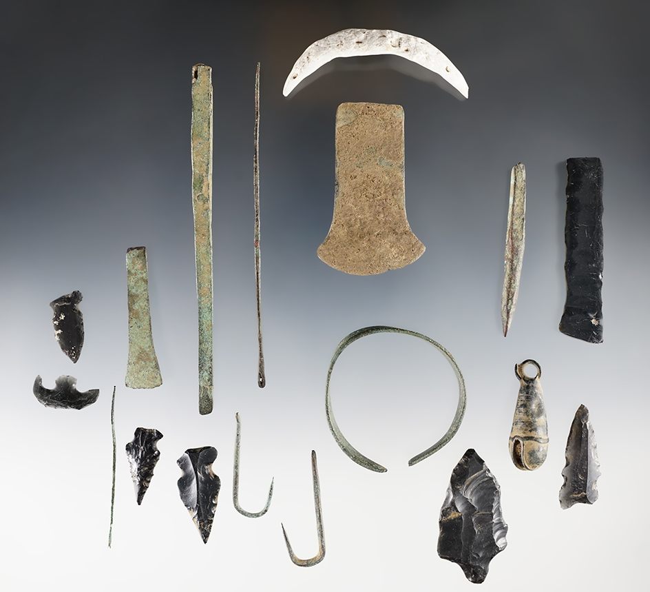 Group of assorted artifacts recovered in Mexico. Includes copper tweezers, bracelet, chisel etc.