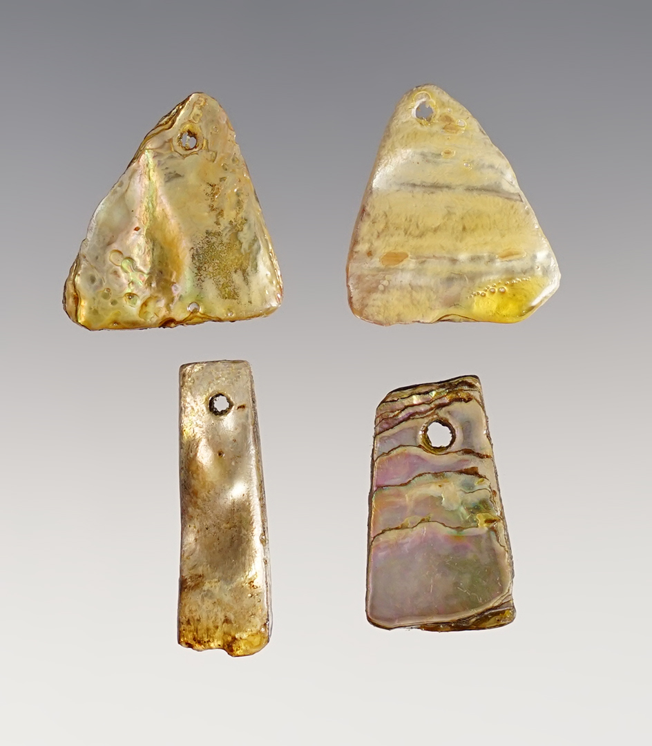 Set of four very attractive shell pendants recovered in Colusa Co., California. 