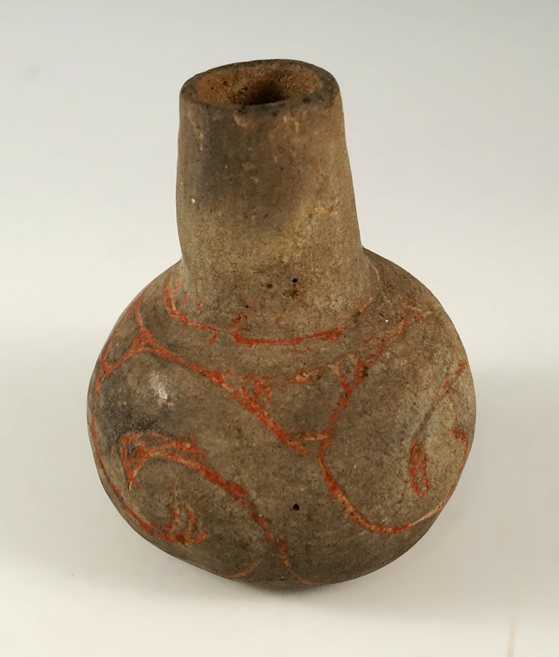 Nice! 3 3/8" Miniature Caddo Bottle that is solid. Found at the J. H. Chadd farm, Harrison Co., TX.