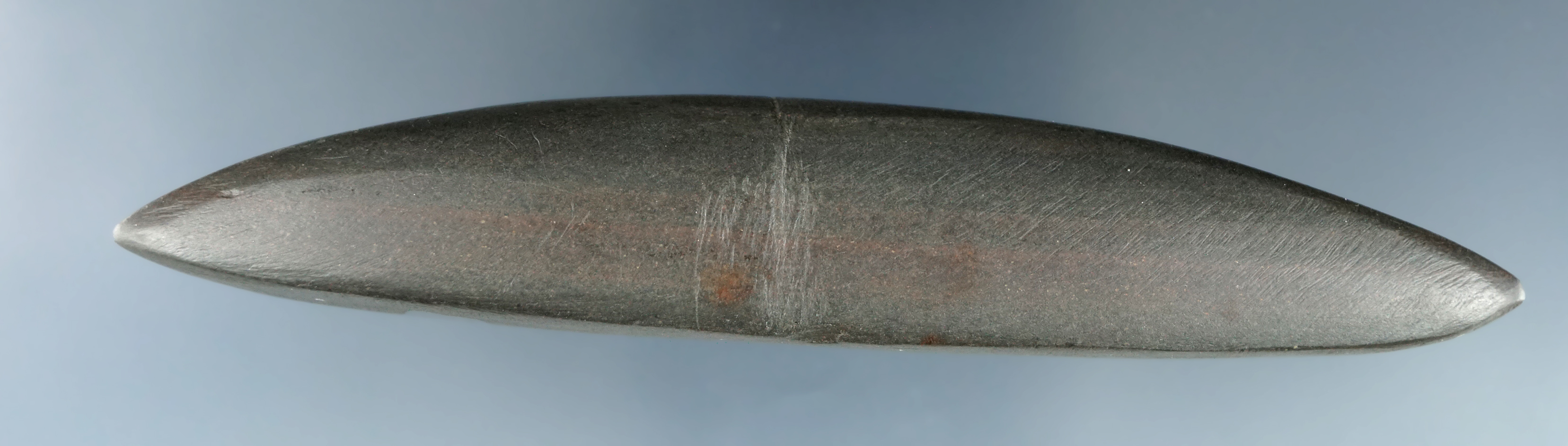 4 5/16" Elliptical Bar Atlatl weight with a groove around the center found in Ohio.