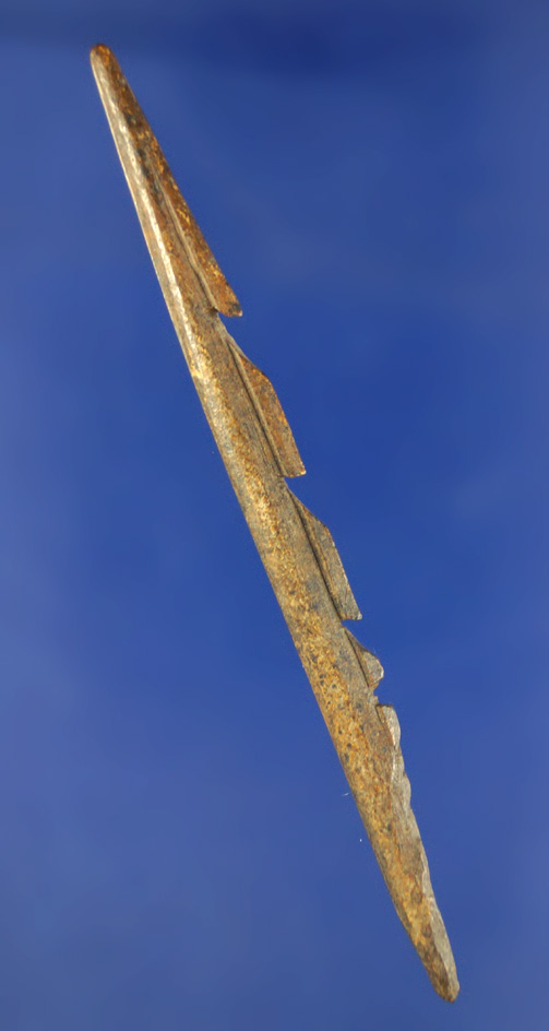 Heavily patinated 3 15/16" bone harpoon tip found in Alaska.