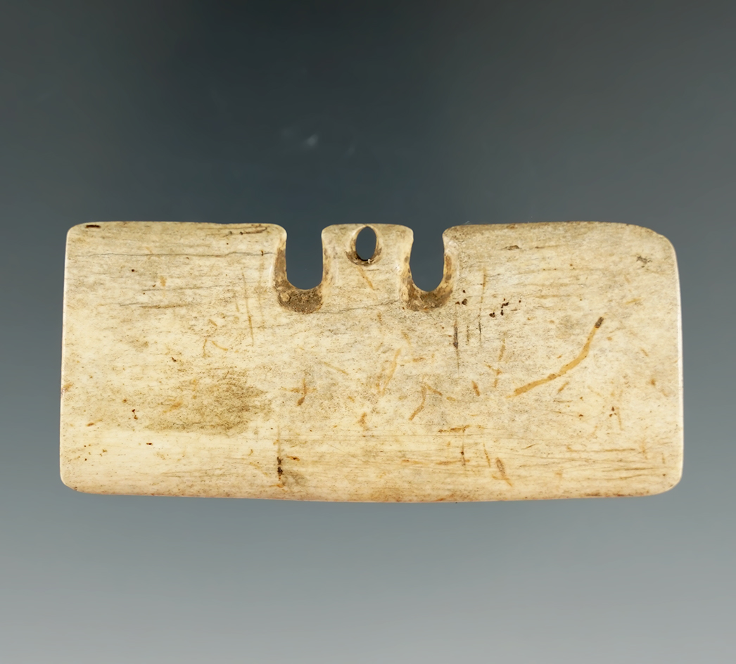 2 5/8" Well styled Bone Inuit  Wrist Guard from Alaska. Very well patinated. Stermer COA.