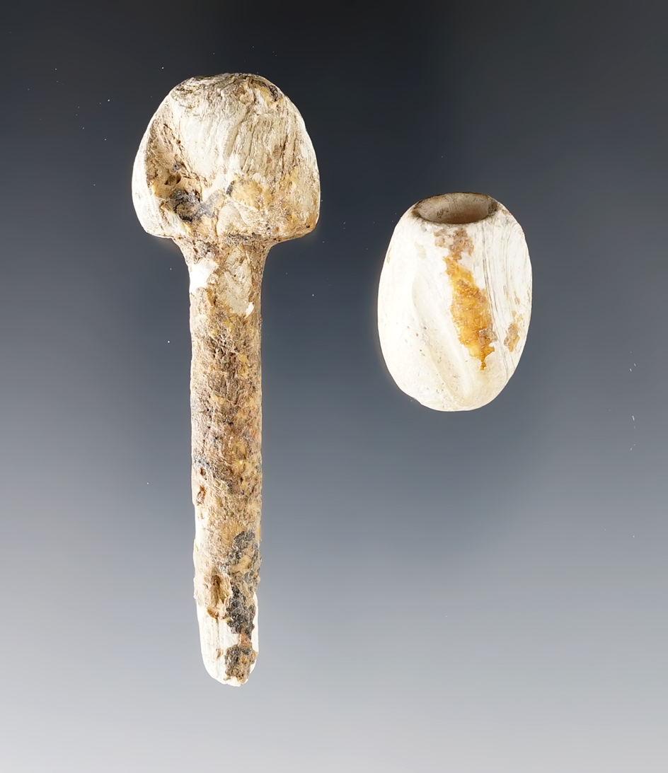 Set including a Shell Bead and a an Ear Ornament that measures 2 9/16". Found in Illinois. 