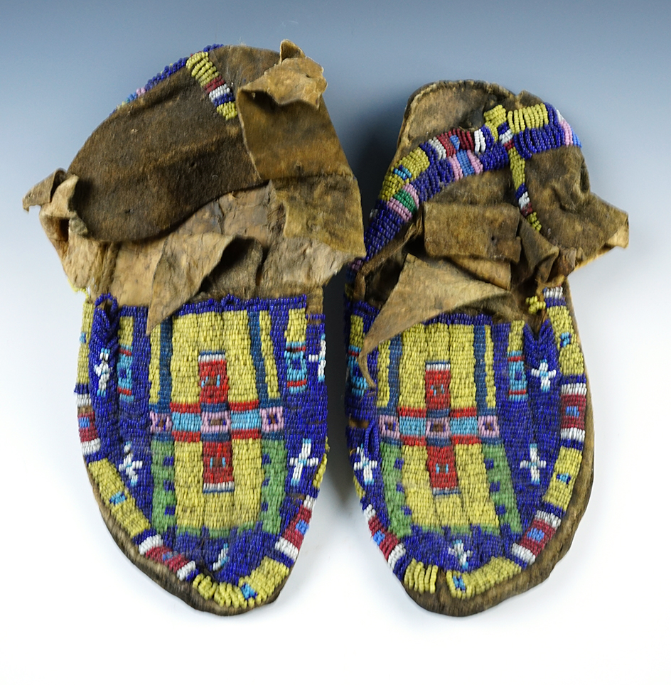 Pair of nicely beaded Moccasins that measure 10" overall. 