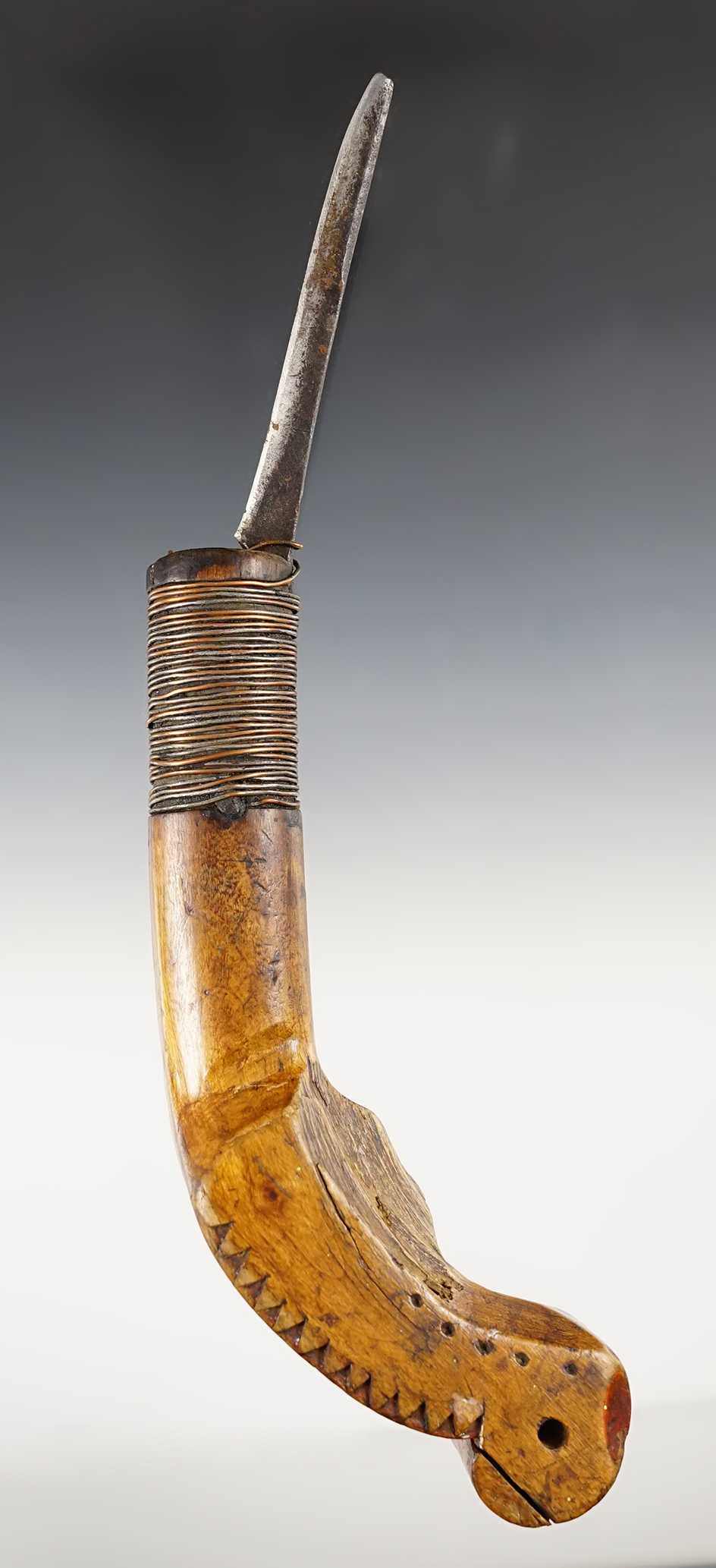 9 7/16" overall length Curved Knife with a wood handle, steel blade and copper wrap. 