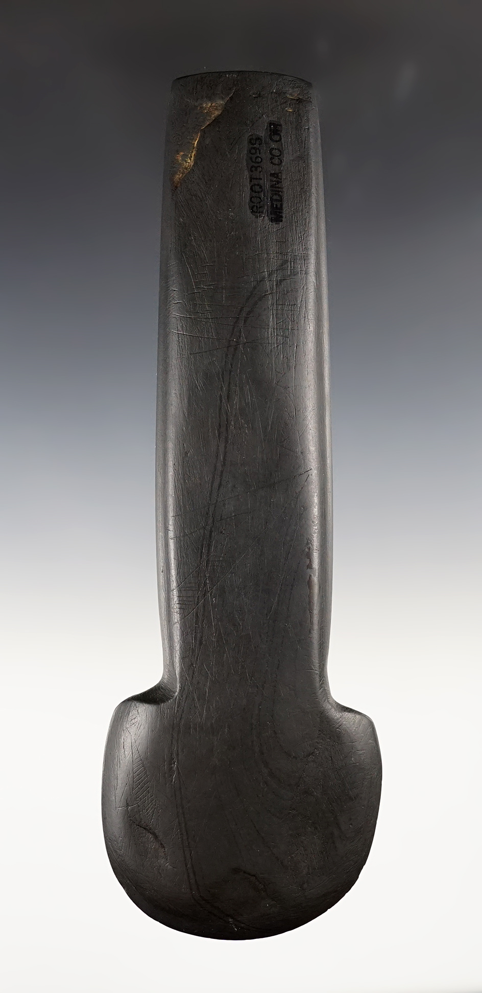 Large 8 1/8" Ft. Ancient Spud made from black slate with engravings to both sides, Ohio. 