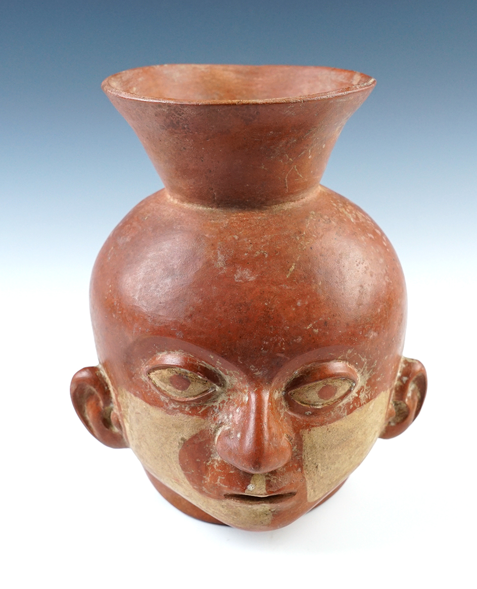 7 1/4" tall x 6 1/4" wide red and white Moche IV Head Pot with a flared top, circa 700 AD. 