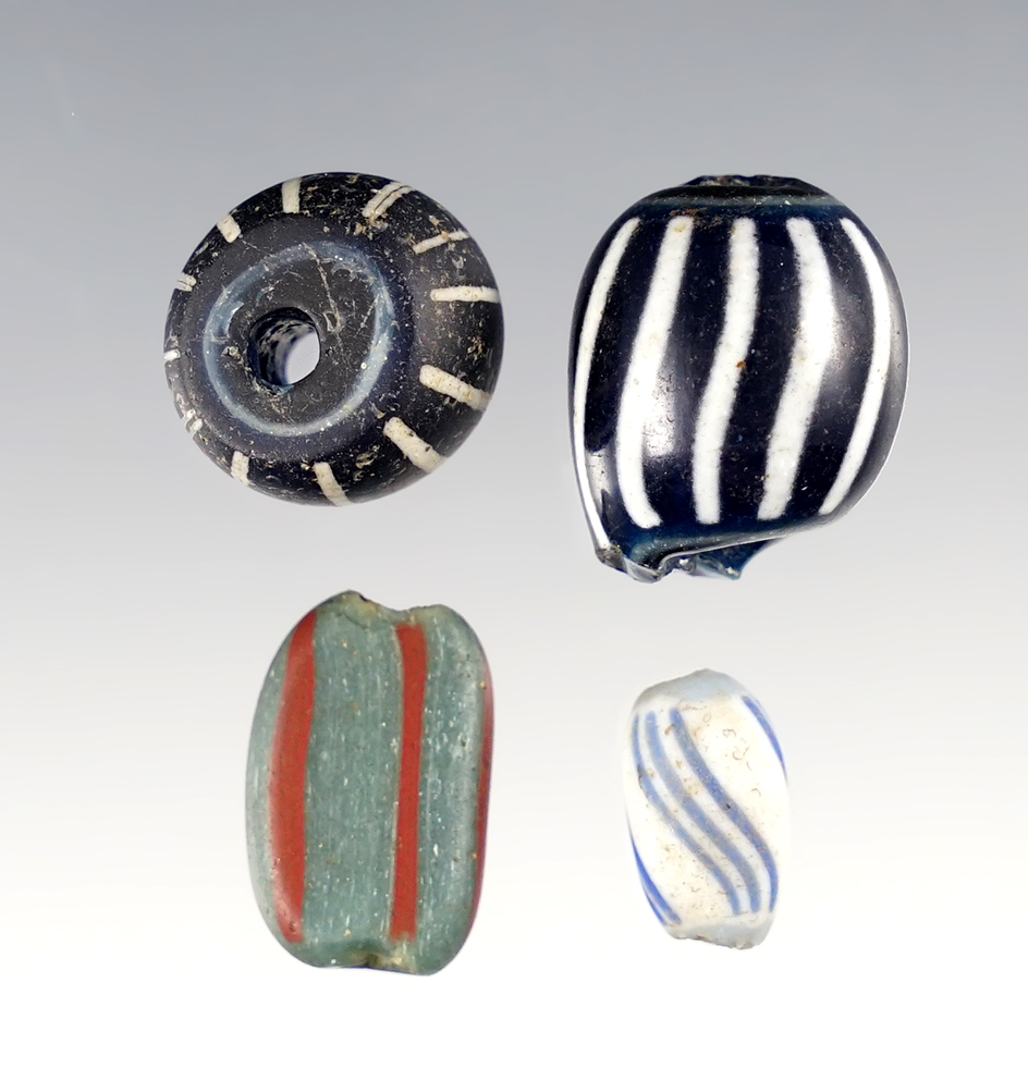 Set of 4 rare beads inc. a large Polychrome, Paddle Pressed and a Huron, Geneva, New York. 