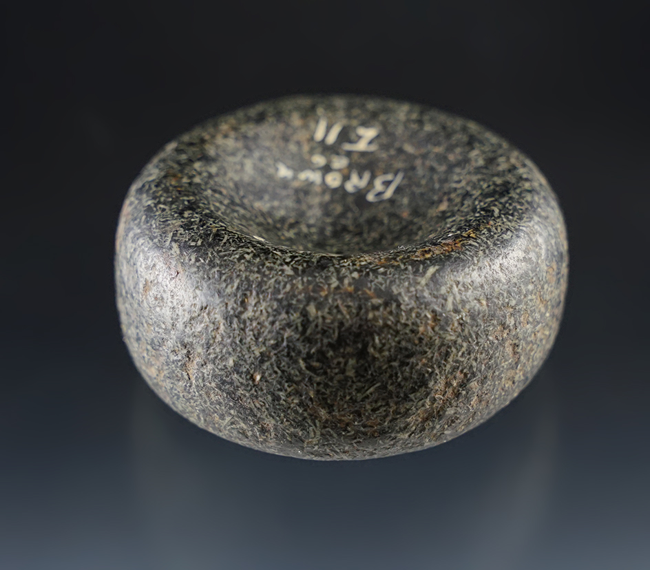 Nicely polished 2" Discoidal made from black Granite, found in Brown Co., Illinois. Ex. Knoblock. 