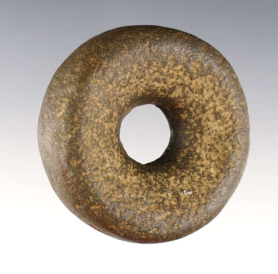 2 3/16" Perforated Hardstone Discoidal found in Iron Co., Missouri. 