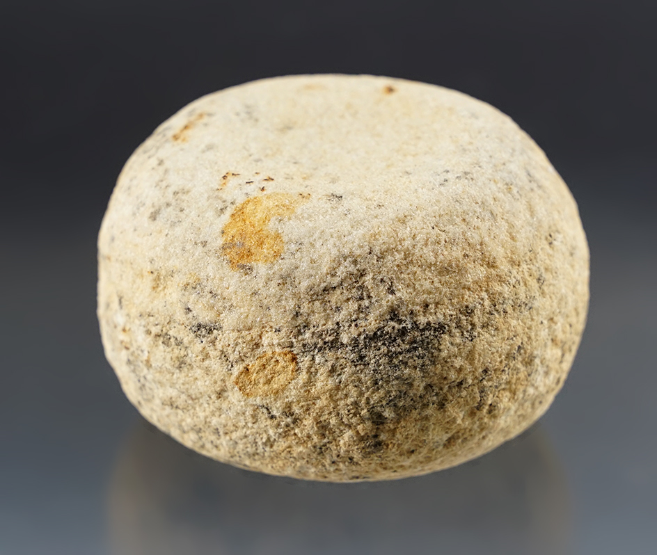 Well patinated 2 7/8" Discoidal made from multi-colored Granite.