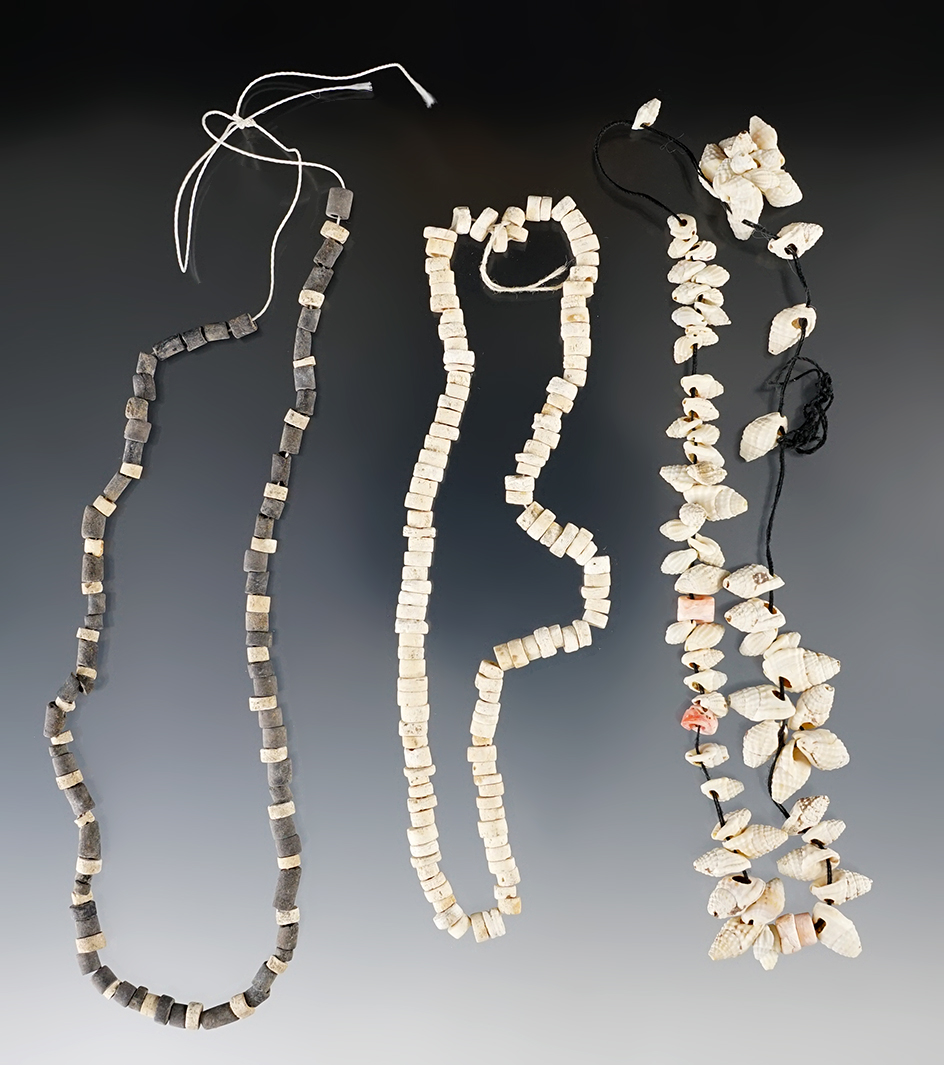 Set of three strands of drilled stone and shell beads found in New Mexico. Largest is 11" long.