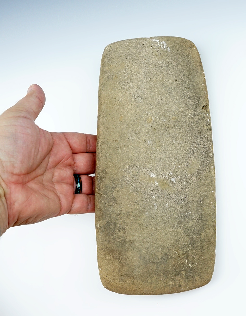 Large! 10 1/4" long by 4 9/16" long well styled stone grinding mano found in New Mexico.