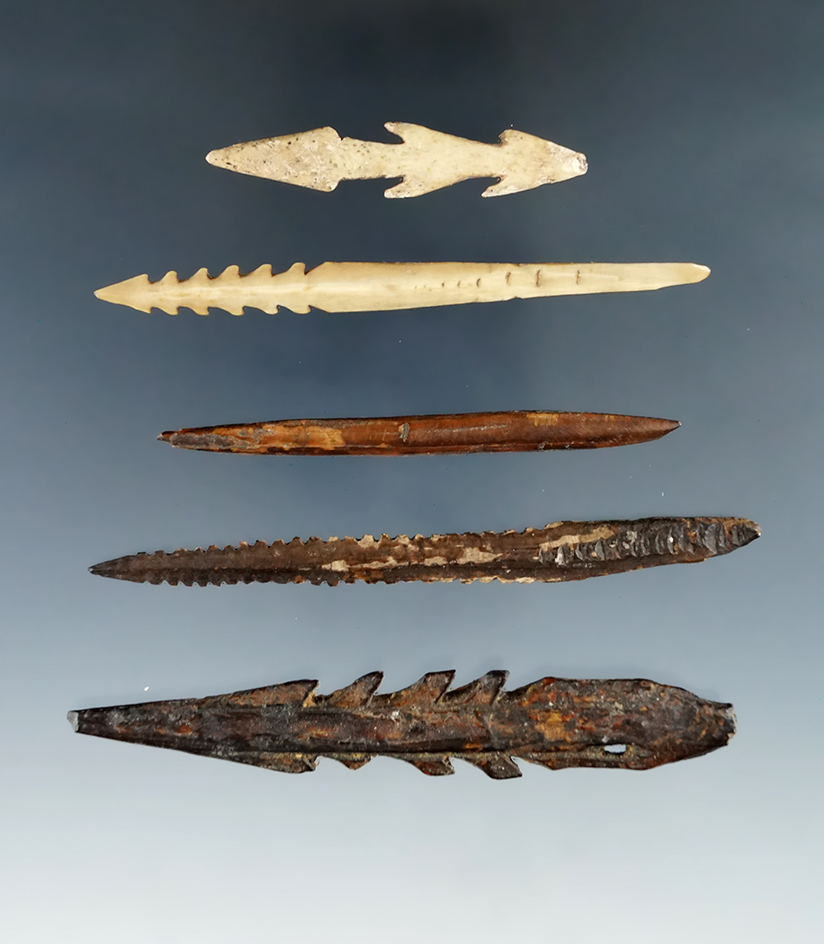 Set of five bone projectiles and harpoon tips found in the Pacific Northwest, largest is 3 9/16".