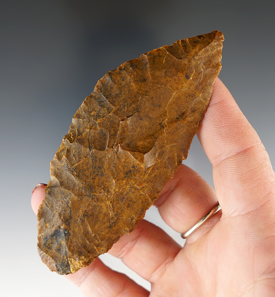 3 15/16" thin and very well flaked petrified wood knife found in southern Colorado.