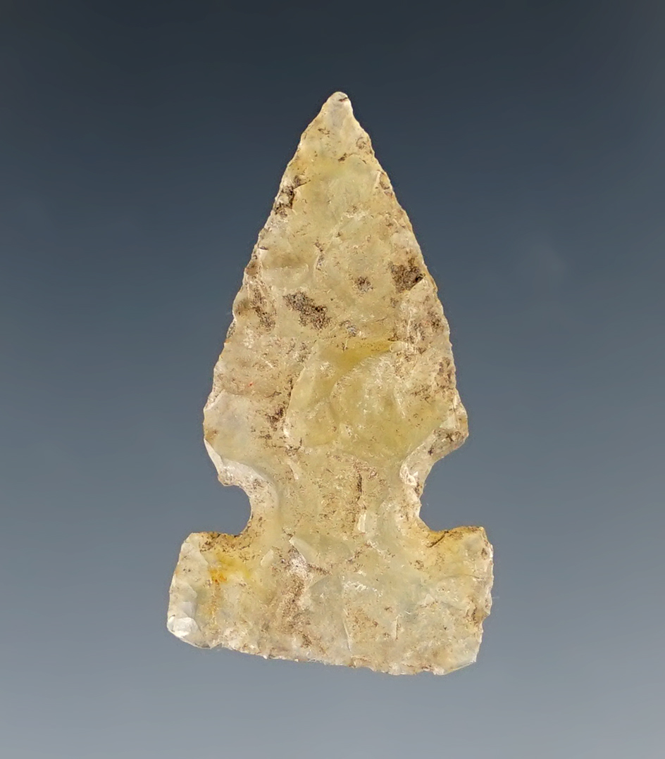 Heavily patinated 1 1/8" Sidenotch arrowhead made from clear dendritic agate found in Wyoming.