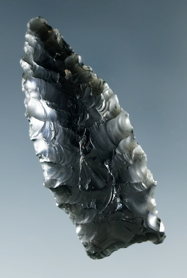 1 11/16" obsidian stemmed dart point with a slight curve to the Blade  found in Humboldt Co., Nevada