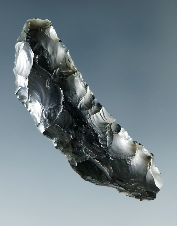 1 9/16" obsidian Paleo Crescent found in Humboldt Co., Nevada.