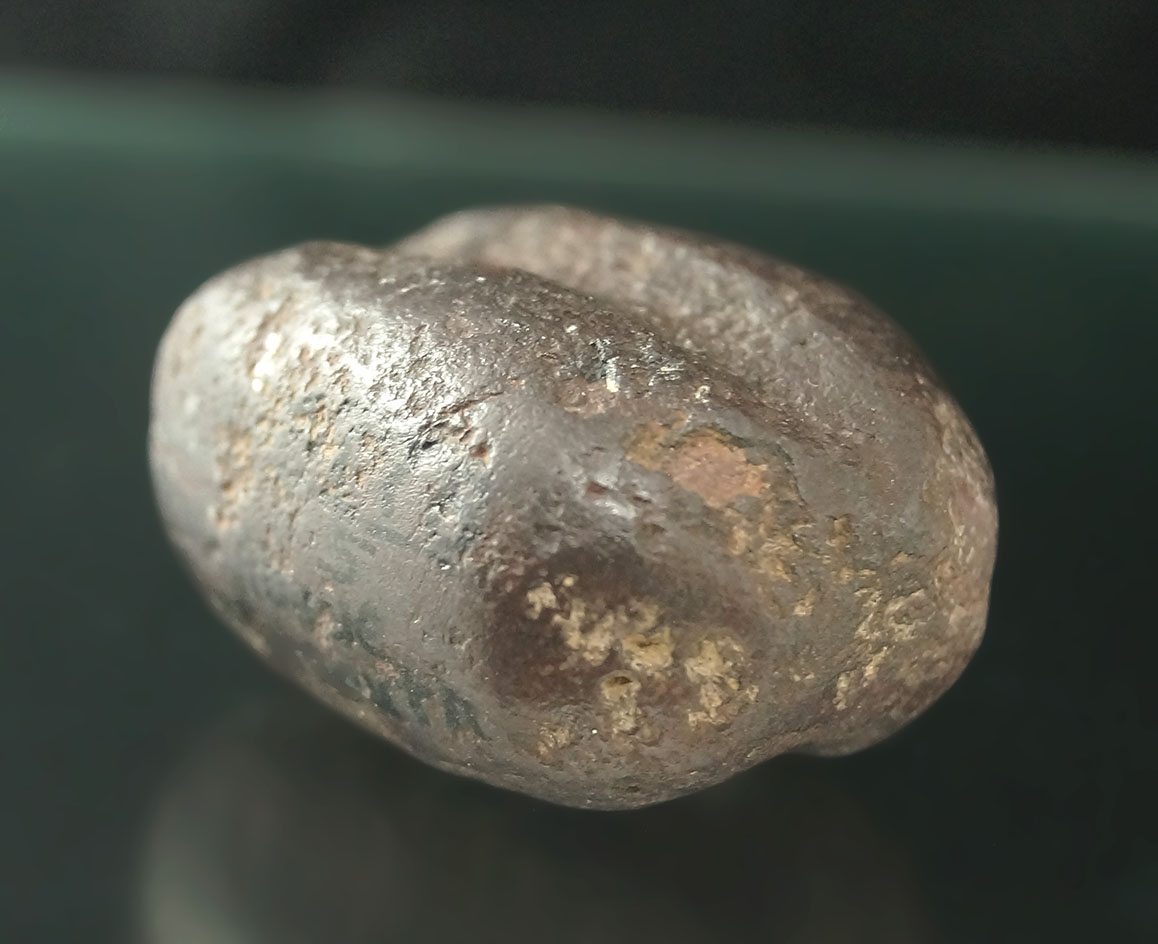 2" Hematite Grooved Loaf Stone from the Dr. Gordon Meuser collection #1778/5.  Portsmouth Ohio.