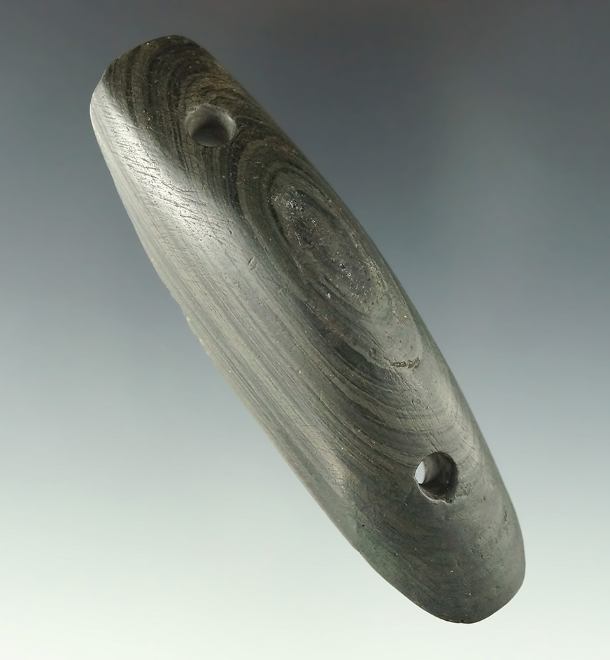 4" drilled humped Gorget with restoration to 1" at one end found in Ashland Co., Ohio.