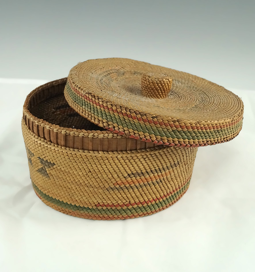 Tightly woven 5 1/2" lidded basket - northern California from the Perry collection with nice designs