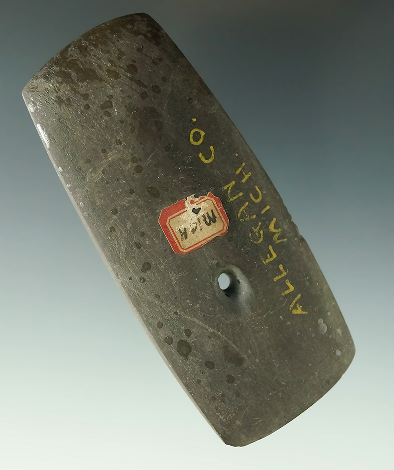 3 11/16" Pendant with one hole drilled, and one hole spotted. Found in Allegan Co., Michigan.