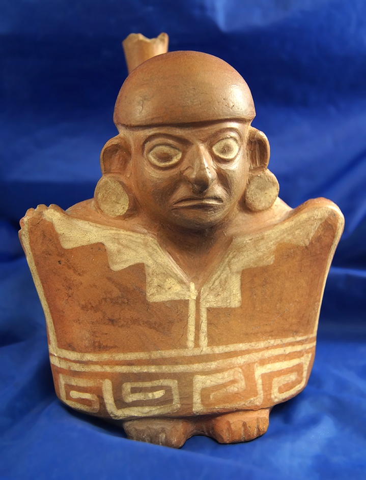 7" tall stirrup bottle depicting a clothes vendor from Peru