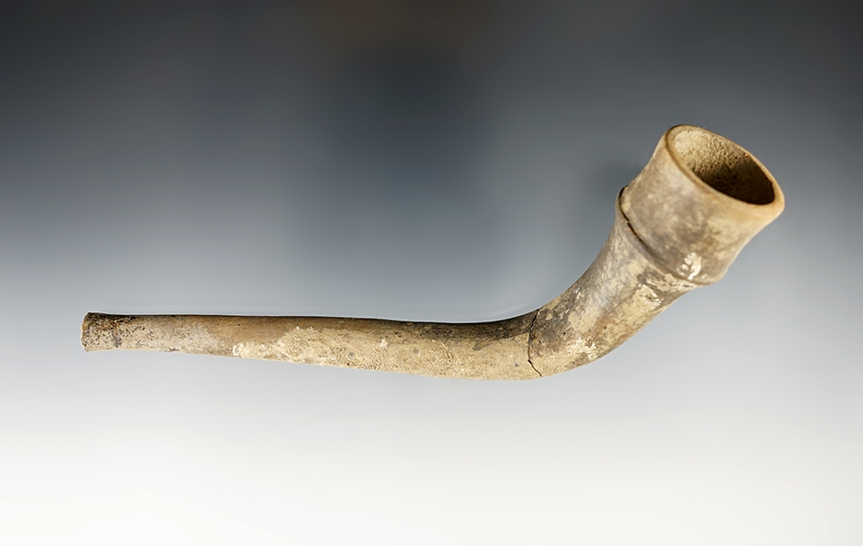 5 1/2" long Iroquois Clay Pipe. No restoration. Broken and glued at elbow.