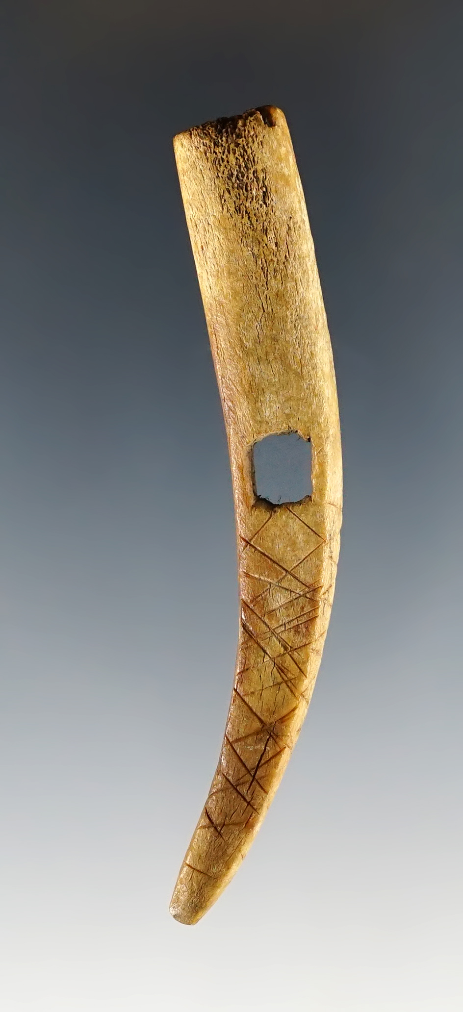 3 5/16" beautifully carved bone pendant found in Colusa Co., California. Ex. Michael Hough.