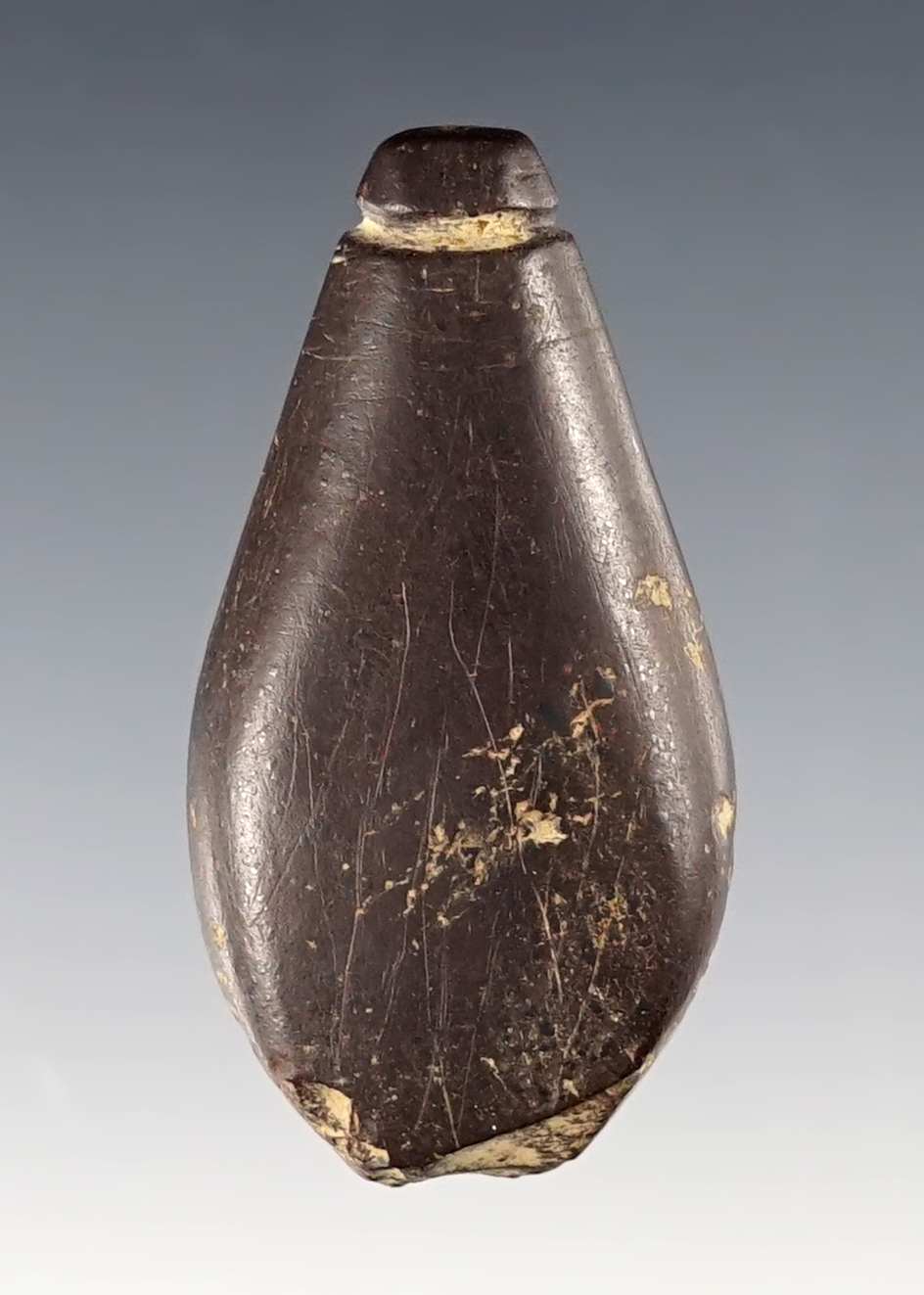 Uniquely styled 2 1/8" Hematite Grooved Plummet found in the Midwest.