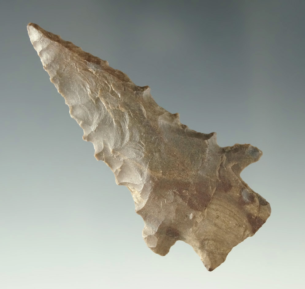 2 5/8" Kirk Stemmed with wicked serrations made from  Dover Flint found in the Tennessee area.