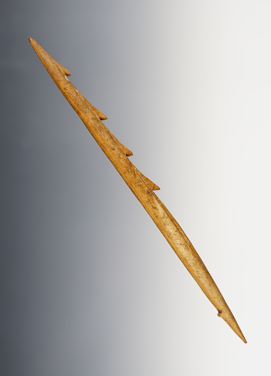 5 7/8" Inuit 4 Barbed Bone Harpoon Tip that is heavily patinated found in Alaska.