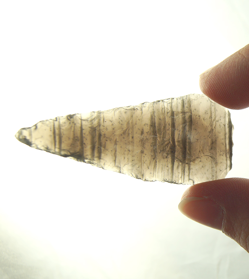 Thin and exceptionally well flaked 2 3/16" Obsidian Triangular  found in Nevada.